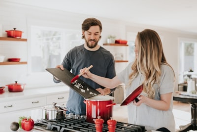Two home cooks preparing a meal together in a bright kitchen